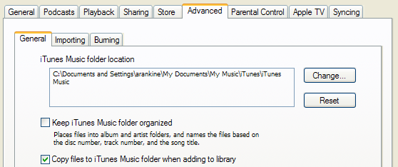 Screenshot of iTunes Preferences dialog showing 'Keep iTunes Music Folder Organized' checkbox